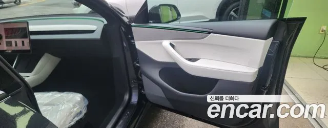 Tesla Model Y — Фото автомобиля 10