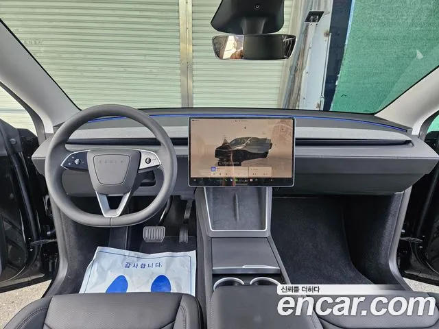 Tesla Model Y — Фото автомобиля 14