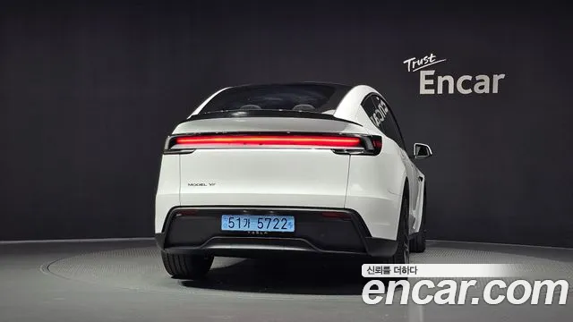 Tesla Model Y — Фото автомобиля 4