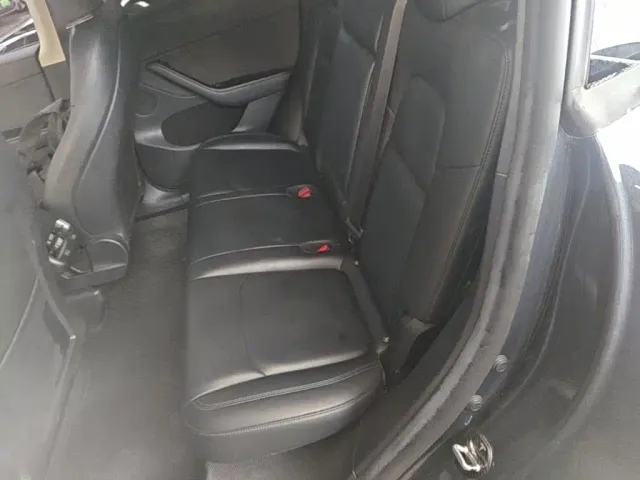 Tesla Model Y — Фото автомобиля 12