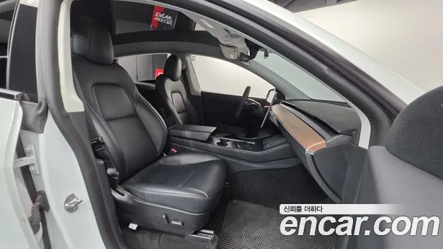 Tesla Model Y — Фото автомобиля 10