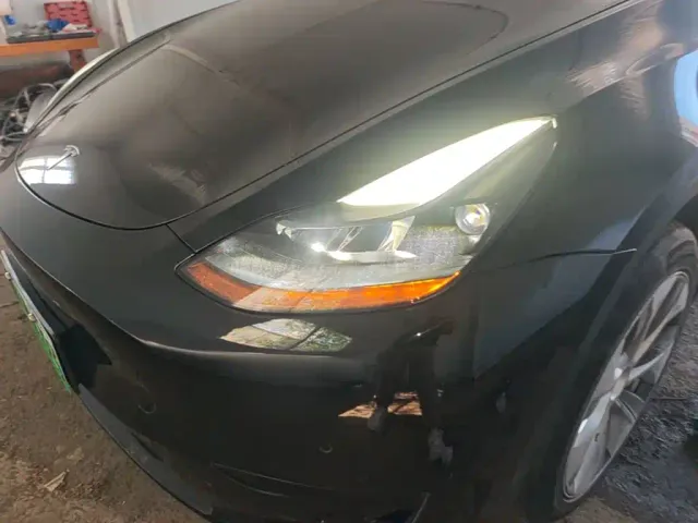 Tesla Model Y — Фото автомобиля 23