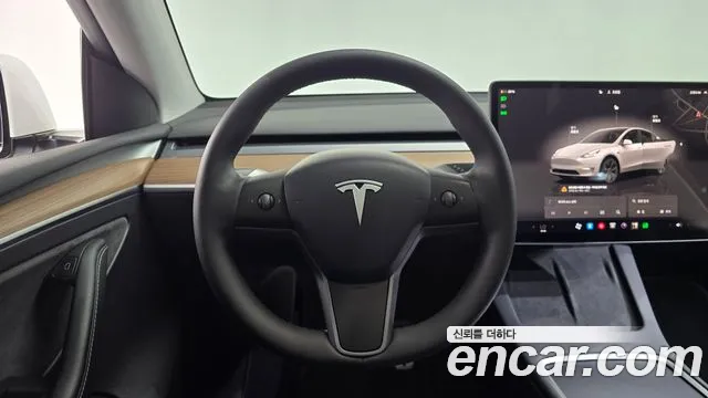 Tesla Model Y — Фото автомобиля 19