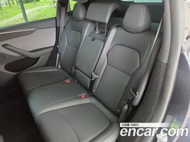 Tesla Model Y — Фото автомобиля 15