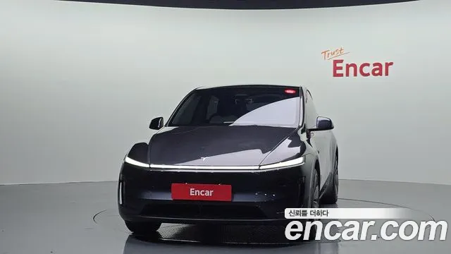 Tesla Model Y — Фото автомобиля 3