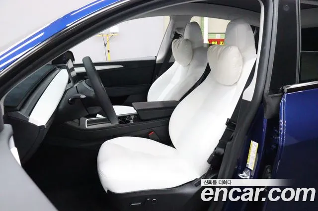 Tesla Model Y — Фото автомобиля 8