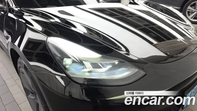 Tesla Model 3 — Фото автомобиля 7