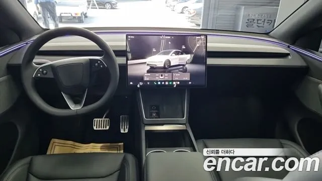 Tesla Model Y — Фото автомобиля 7