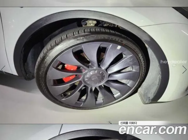 Tesla Model Y — Фото автомобиля 10