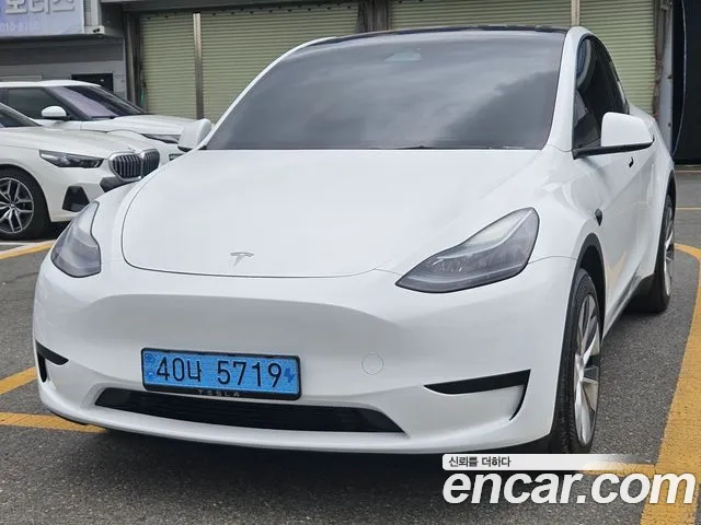 Tesla Model Y — Фото автомобиля 3