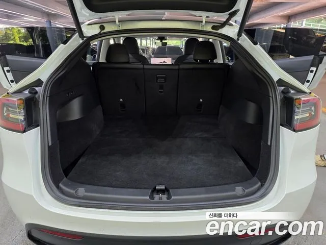 Tesla Model Y — Фото автомобиля 8