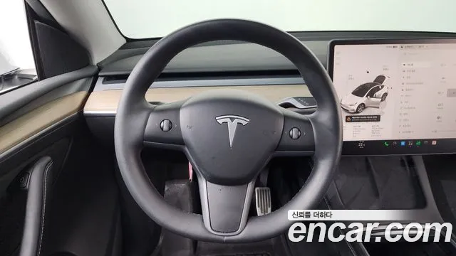 Tesla Model Y — Фото автомобиля 18