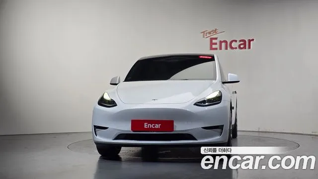 Tesla Model Y — Фото автомобиля 3