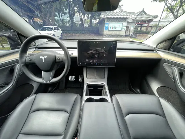 Tesla Model Y — Фото автомобиля 6