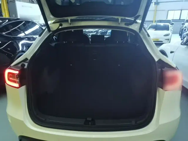 Tesla Model Y — Фото автомобиля 18