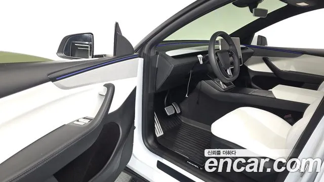 Tesla Model Y — Фото автомобиля 15