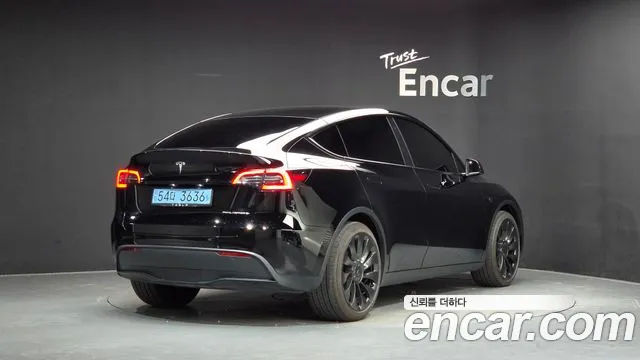 Tesla Model Y — Фото автомобиля 2