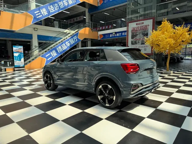 Audi Q2L — Фото автомобиля 10