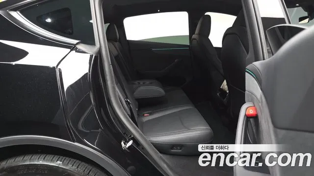 Tesla Model Y — Фото автомобиля 10