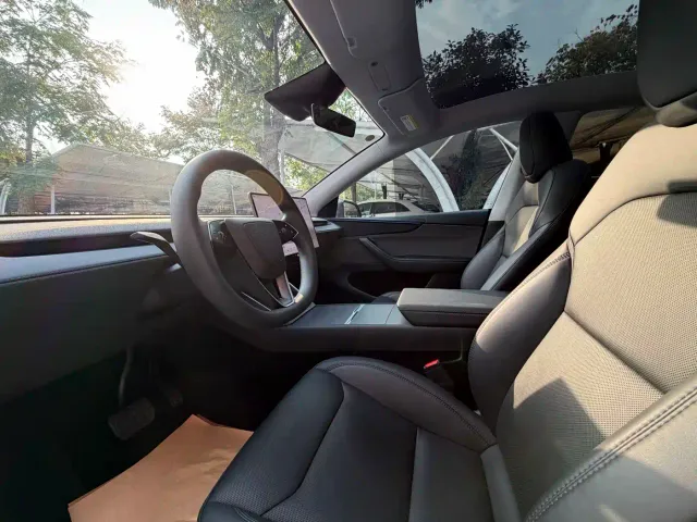 Tesla Model Y — Фото автомобиля 3