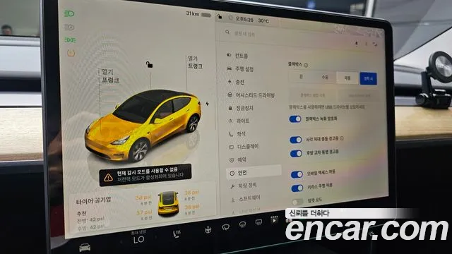 Tesla Model Y — Фото автомобиля 26