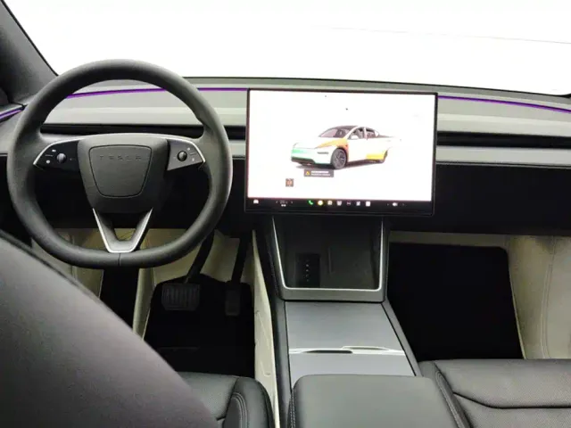 Tesla Model Y — Фото автомобиля 12