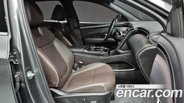 Hyundai Tucson Tucson (NX4) Бензин 1.6 турбо 2WD — Фото автомобиля 10