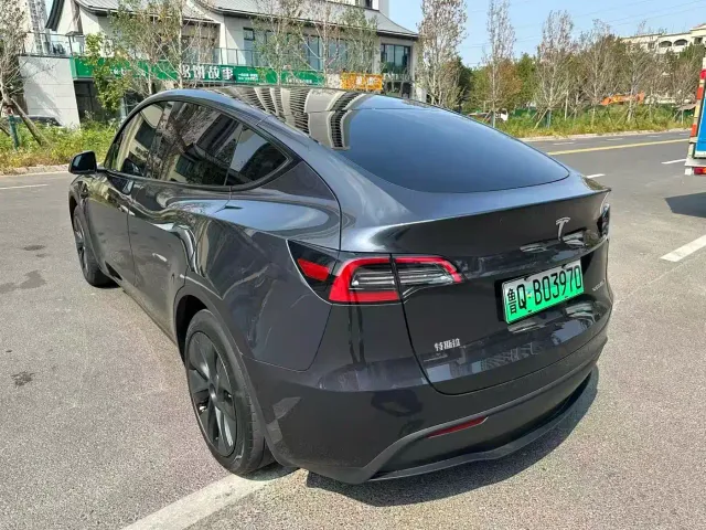 Tesla Model Y — Фото автомобиля 8
