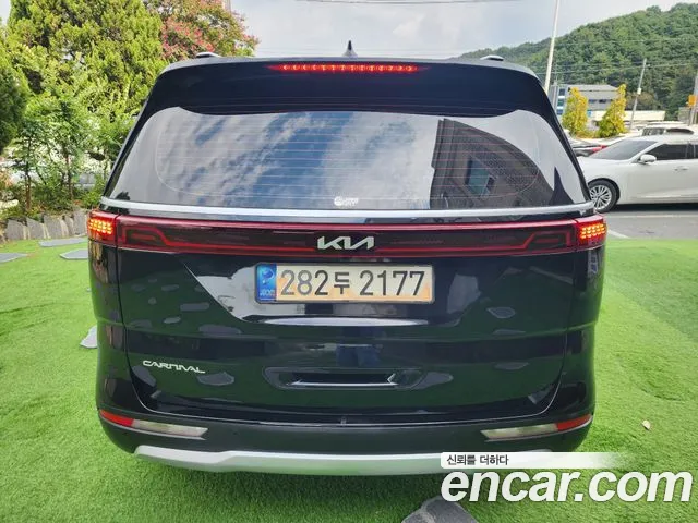 Kia Carnival Generation 4 — Фото автомобиля 3