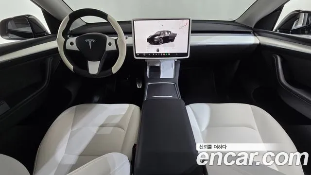 Tesla Model Y — Фото автомобиля 10