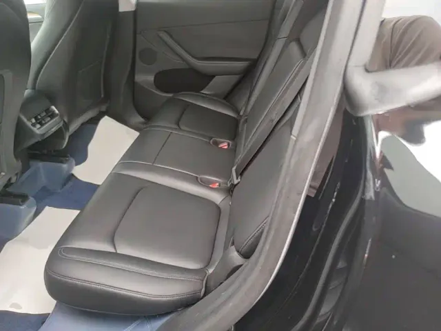 Tesla Model Y — Фото автомобиля 16