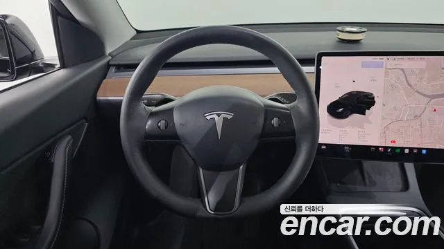 Tesla Model Y — Фото автомобиля 13