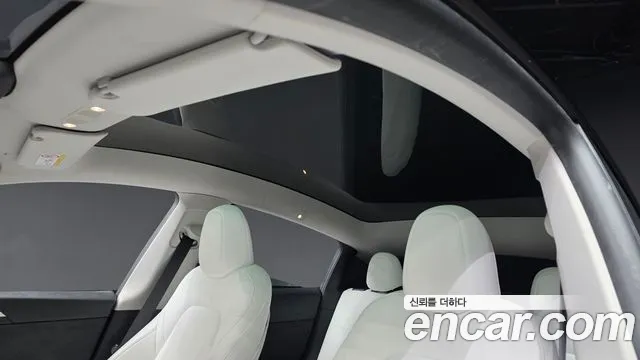 Tesla Model Y — Фото автомобиля 25