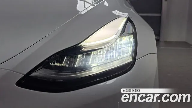 Tesla Model Y — Фото автомобиля 7