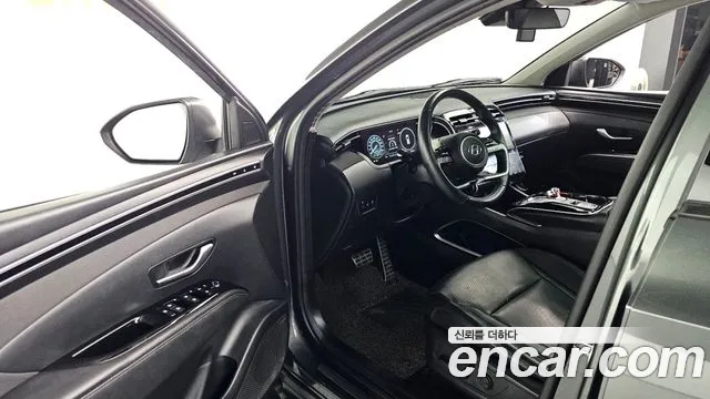 Hyundai Tucson Tucson (NX4) Бензин 1.6 Turbo 4WD — Фото автомобиля 10