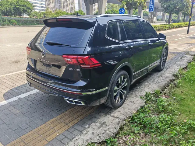 Volkswagen Tiguan L — Фото автомобиля 11