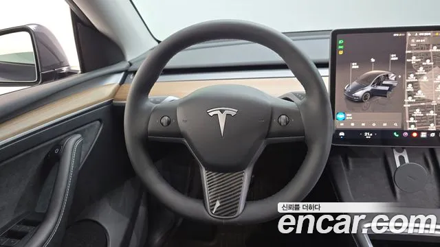 Tesla Model Y — Фото автомобиля 19