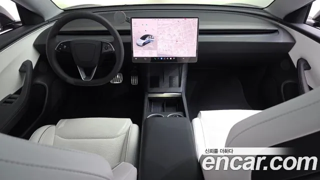 Tesla Model 3 — Фото автомобиля 10