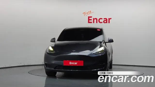 Tesla Model Y — Фото автомобиля 3