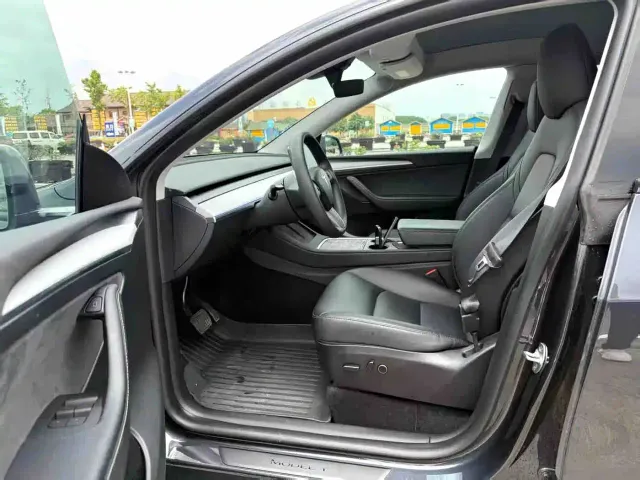 Tesla Model Y — Фото автомобиля 8