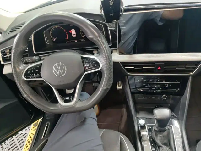 Volkswagen Tiguan L — Фото автомобиля 9