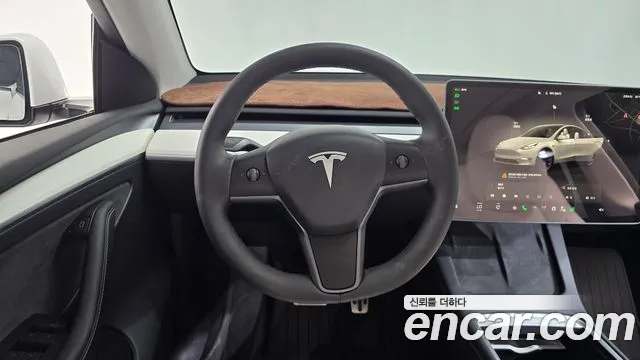 Tesla Model Y — Фото автомобиля 19