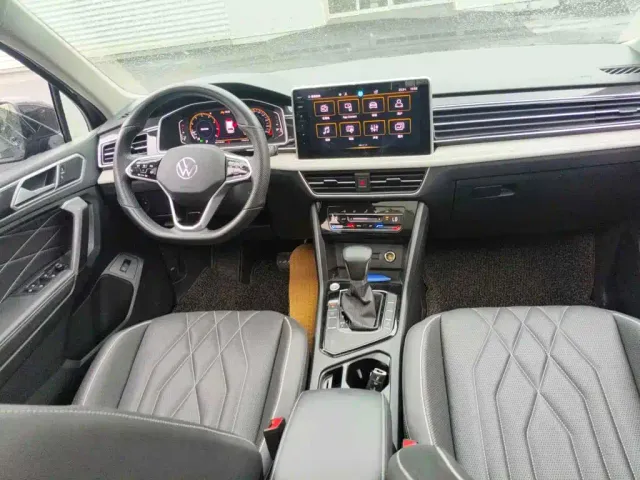 Volkswagen Tiguan L — Фото автомобиля 12