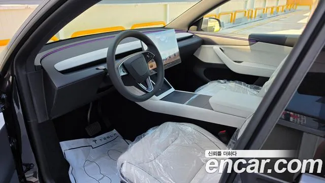 Tesla Model Y — Фото автомобиля 13