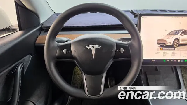 Tesla Model Y — Фото автомобиля 19