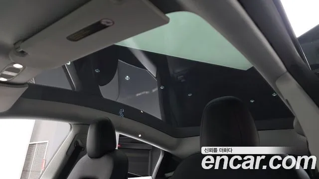 Tesla Model Y — Фото автомобиля 22
