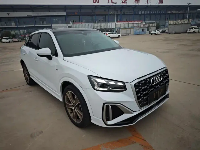 Audi Q2L — Фото автомобиля 9