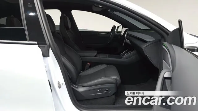 Tesla Model Y — Фото автомобиля 23