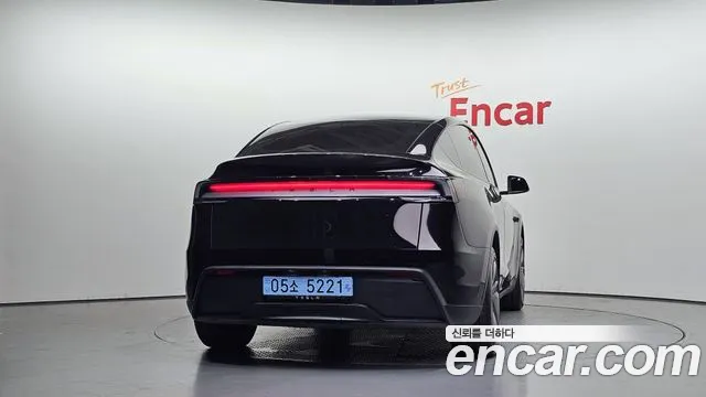 Tesla Model Y — Фото автомобиля 4