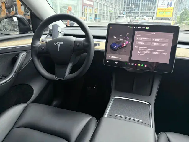 Tesla Model Y — Фото автомобиля 14